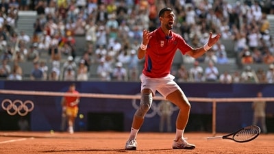It was the last major title missing from his career: on August 4, Novak Djokovic took Olympic gold by defeating Spain's Carlos Alcaraz. Photographer Patricia de Melo Moreira was there to snap the moment he completed the so-called "Golden Slam" of titles and the usually stoic champion marked it with a roar of emotion. She had been placed until the last moment on Alcaraz's side. It was the last major title missing from his career: on August 4, Novak Djokovic took Olympic gold by defeating Spain's Carlos Alcaraz. Photographer Patricia de Melo Moreira was there to snap the moment he completed the so-called "Golden Slam" of titles and the usually stoic champion marked it with a roar of emotion. She had been placed until the last moment on Alcaraz's side.