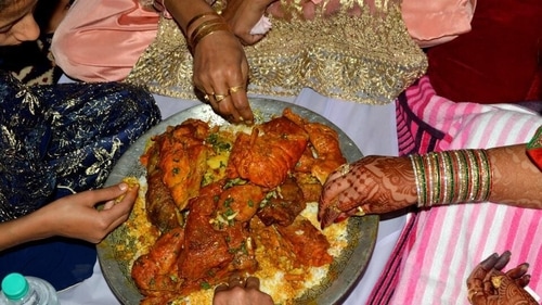 In Kashmiri, weddings hosts traditionally serve a couple of feasts known as Kashmiri wazwan comprising seven to 12 courses served in big copper plates (File Photo)