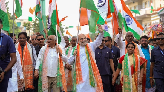 Union Home Minister and Minister of Cooperation Amit Shah takes part in a 'Har Ghar Tiranga Yatra' campaign rally, in Ahmedabad, (PTI)