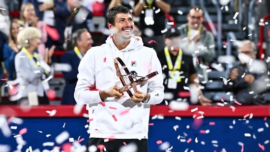 Alexei Popyrin of Australia celebrates with his trophy after defeating Andrey Rublev in two sets 6-2, 6-4 during the Men's Singles Final match on day seven of the ATP Masters 1000 National Bank Open (Getty Images via AFP)