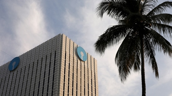 The logo of State Bank of India (SBI) is seen on the facade of its headquarters in Mumbai, India.(Reuters)