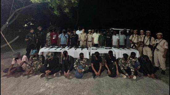 Security forces with the arrested youths. (Sourced photo)