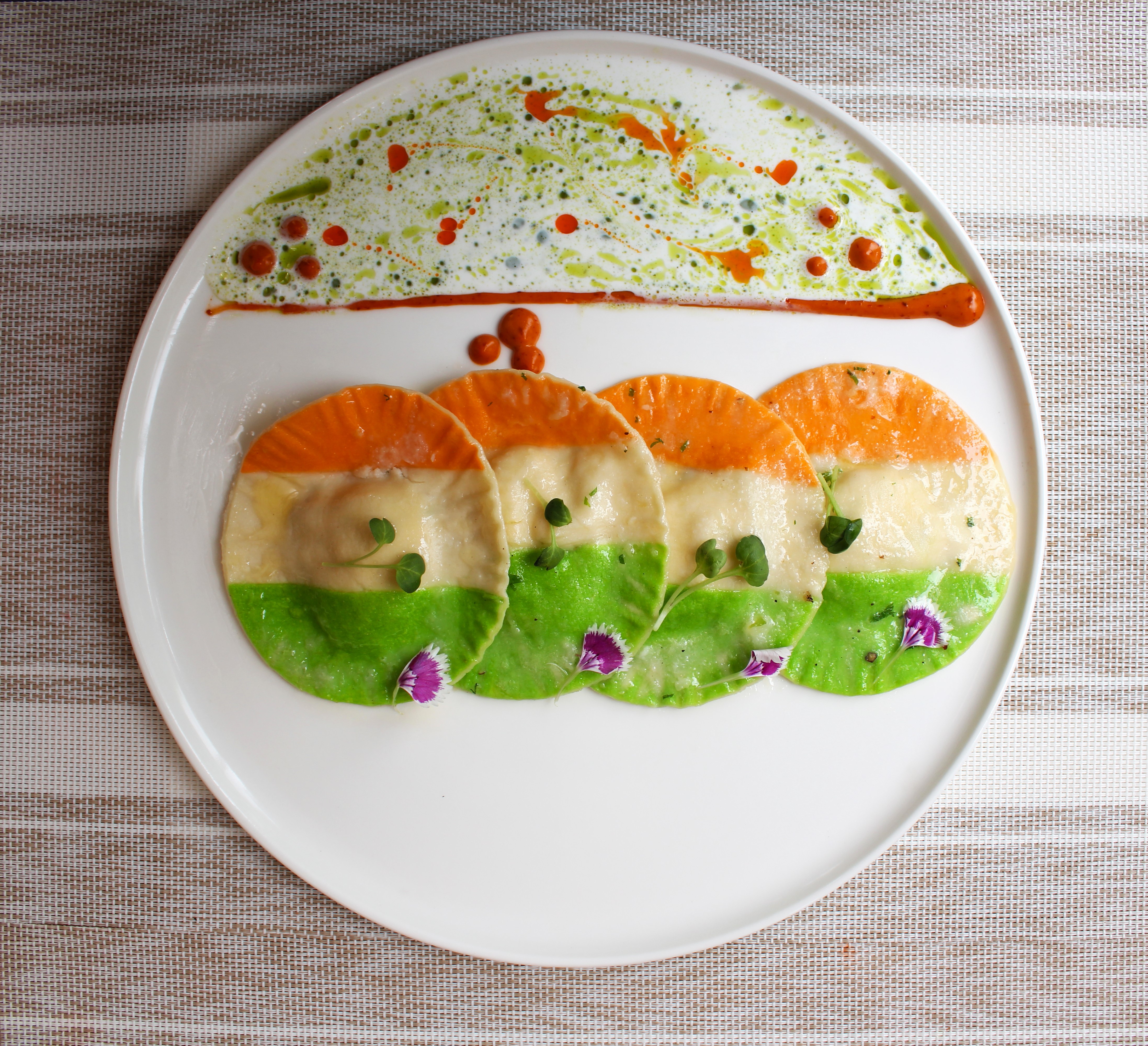 Tricolor Ravioli filled with vibrant flavours, merging the colours of the Indian flag into a delicious, patriotic dish.