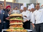 Burger Chachu (Sharandeep Singh) set world record with 112 kg veggie burger (Burger Chachu/Instagram) Burger Chachu (Sharandeep Singh) set world record with 112 kg veggie burger (Burger Chachu/Instagram)
