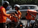 Gig workers prepare to deliver orders outside Swiggy's grocery warehouse at a market area in New Delhi, India, May 6, 2024. (Priyanshu Singh/Reuters) Gig workers prepare to deliver orders outside Swiggy's grocery warehouse at a market area in New Delhi, India, May 6, 2024. (Priyanshu Singh/Reuters)
