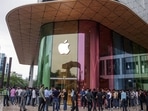 Customers queue outside an Apple Inc. store ahead of its opening hours during the first day of sale of the iPhone 15 smartphone in Mumbai. (Bloomberg)