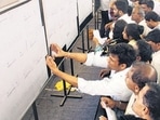 Mumbai, India - 24 Feb. 2016 : People checking out there name in the list of MHADA lottery results were to be announced at Rang Sharda Hotel,Bandra in Mumbai, India, on Wednesday, February 24, 2016. (Photo by Pramod Thakur/ Hindustan Times) (Hindustan Times) Mumbai, India - 24 Feb. 2016 : People checking out there name in the list of MHADA lottery results were to be announced at Rang Sharda Hotel,Bandra in Mumbai, India, on Wednesday, February 24, 2016. (Photo by Pramod Thakur/ Hindustan Times) (Hindustan Times)