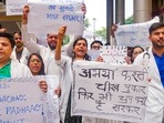 New Delhi: Doctors stage a protest over the sexual assault and murder of a postgraduate trainee doctor in Kolkata, at Ram Manohar Lohia Hospital, in New Delhi, Wednesday, Aug. 14, 2024. (PTI Photo) New Delhi: Doctors stage a protest over the sexual assault and murder of a postgraduate trainee doctor in Kolkata, at Ram Manohar Lohia Hospital, in New Delhi, Wednesday, Aug. 14, 2024. (PTI Photo)