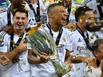 Kylian Mbappe celebrates his first trophy with Real Madrid teammates(REUTERS)