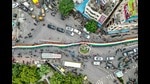TOPSHOT - An aerial view shows school students carrying a large Indian national flag on a road during the 'Har Ghar Tiranga' campaign on the eve of the country's Independence Day celebrations in Vijayawada on August 14, 2024. (Photo by Idrees MOHAMMED / AFP) (AFP) TOPSHOT - An aerial view shows school students carrying a large Indian national flag on a road during the 'Har Ghar Tiranga' campaign on the eve of the country's Independence Day celebrations in Vijayawada on August 14, 2024. (Photo by Idrees MOHAMMED / AFP) (AFP)