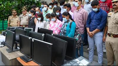 Sector 63 police station has arrested 20 people for running a fake call center in Sector 63. (Sunil Ghosh/HT Photo)