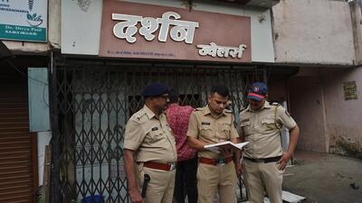 Thane, India - August 14, 2024: Two unidentified assailants fired a gun on Darshan Jewellers, a gold and silver shop in the Balkum area of Thane on Wednesday One accused has been arrested and further police investigation is on , in Thane ,in Mumbai, India, on, Wednesday, August 14, 2024. ( Praful Gangurde /HT Photo ) Thane, India - August 14, 2024: Two unidentified assailants fired a gun on Darshan Jewellers, a gold and silver shop in the Balkum area of Thane on Wednesday One accused has been arrested and further police investigation is on , in Thane ,in Mumbai, India, on, Wednesday, August 14, 2024. ( Praful Gangurde /HT Photo )