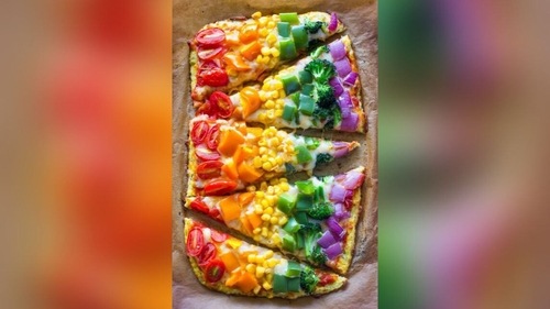 A colourful twist on a classic, rainbow pizza is topped with a variety of veggies for a fun and nutritious meal. (Pinterest) A colourful twist on a classic, rainbow pizza is topped with a variety of veggies for a fun and nutritious meal. (Pinterest)