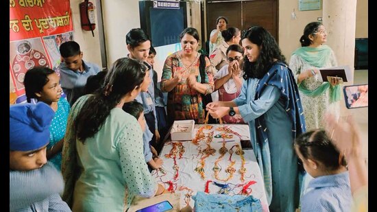 Deputy Commissioner Sakshi Sawhney inaugurated a Rakhi stall run by specially-abled students from Government Primary Smart School, Model Gram. (HT Photo)