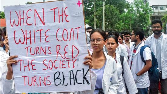 Doctors and medical students hold posters as they protest against the alleged rape and murder of a female postgraduate trainee doctor of Kolkata’s RG Kar Medical College. (ANI Photo)