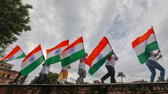 Independence Day 2024: People wave the Indian national flag. India celebrates its 78th Independence Day this year. (PTI)