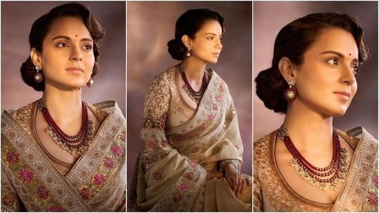 Kangana attended the trailer launch of her upcoming film, Emergency, today. The actor wore a regal cream saree featuring delicate floral embroidery for the event. She styled the nine yards with a statement blouse, ruby and gold jewels pieces, a coiffed hairdo, and minimal makeup. (Instagram)