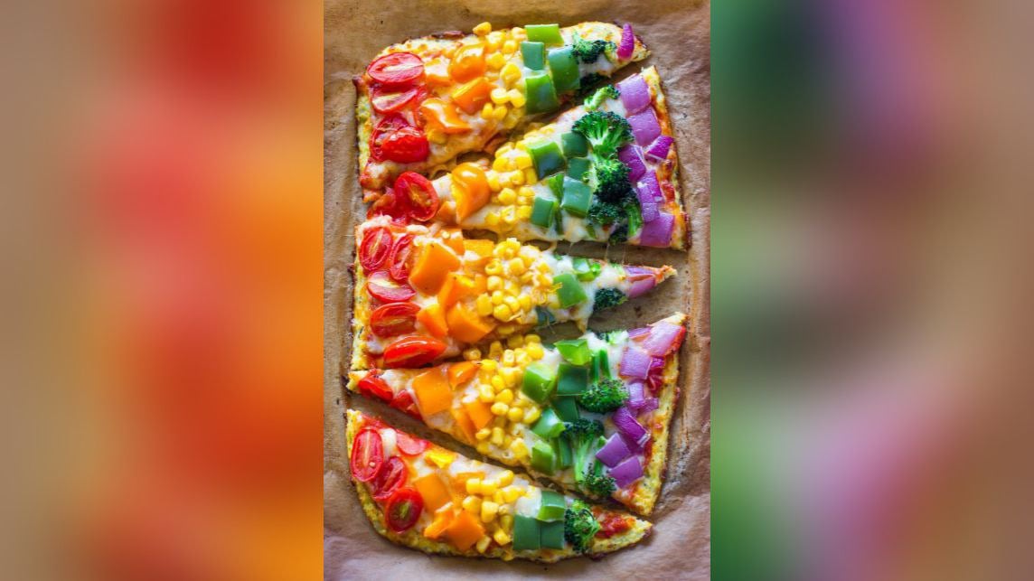 A colourful twist on a classic, rainbow pizza is topped with a variety of veggies for a fun and nutritious meal.(Pinterest) A colourful twist on a classic, rainbow pizza is topped with a variety of veggies for a fun and nutritious meal.(Pinterest)