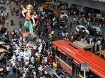 A giant idol of Lord Ganesha being brought by the devotees towards a pandal ahead of the Ganesh Chaturthi festival. (ANI Photo)(Ashish Vaishnav) A giant idol of Lord Ganesha being brought by the devotees towards a pandal ahead of the Ganesh Chaturthi festival. (ANI Photo)(Ashish Vaishnav)