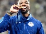 Gold medalist, Noah Lyles, of the United States, poses on the podium after the men's 100-meter final at the 2024 Summer Olympics, Monday, Aug. 5, 2024, in Saint-Denis, France. (AP Photo/Matthias Schrader, File)(AP) Gold medalist, Noah Lyles, of the United States, poses on the podium after the men's 100-meter final at the 2024 Summer Olympics, Monday, Aug. 5, 2024, in Saint-Denis, France. (AP Photo/Matthias Schrader, File)(AP)