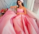 Taapsee Pannu exudes old Hollywood glamour in this dusty pink gown from Maison Tai. The strapless gown has been further spruced up with a pearl neckpiece and a rosette hair pink to complete the look. Taapsee Pannu exudes old Hollywood glamour in this dusty pink gown from Maison Tai. The strapless gown has been further spruced up with a pearl neckpiece and a rosette hair pink to complete the look.