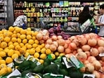 People shop at a grocery store in Rosemead, California. US consumer inflation eased slightly in July, according to US Labor Department data. People shop at a grocery store in Rosemead, California. US consumer inflation eased slightly in July, according to US Labor Department data.