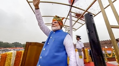 Prime Minister Narendra Modi greets the gathering at the Red Fort after hoisting the national flag on 78th Independence Day. (PTI) Prime Minister Narendra Modi greets the gathering at the Red Fort after hoisting the national flag on 78th Independence Day. (PTI)