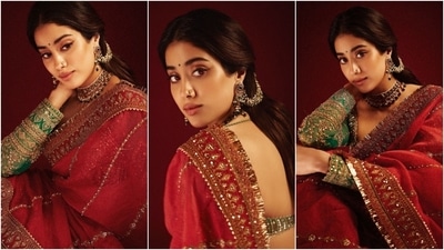 Janhvi Kapoor draped herself in a sindoori red saree and an aqua green blouse adorned with intricate gold zari work to attend an event at NMACC with Shikhar Pahariya. She wore the nine yards with a choker necklace, earrings, striking glam, rings, and high heels. (Instagram) Janhvi Kapoor draped herself in a sindoori red saree and an aqua green blouse adorned with intricate gold zari work to attend an event at NMACC with Shikhar Pahariya. She wore the nine yards with a choker necklace, earrings, striking glam, rings, and high heels. (Instagram)