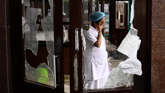 Kolkata, India - Aug. 15, 2024: A senior nurse break down in tear after looking the vandalism by unidentified mob at Emergency department in RG Kar Medical College & Hospital shortly after midnight 'Reclaim the Night' protest against rape and murder of a trainee doctor in Kolkata, India, on Thursday, August 15, 2024. (Photo by Samir Jana/ Hindustan Times)