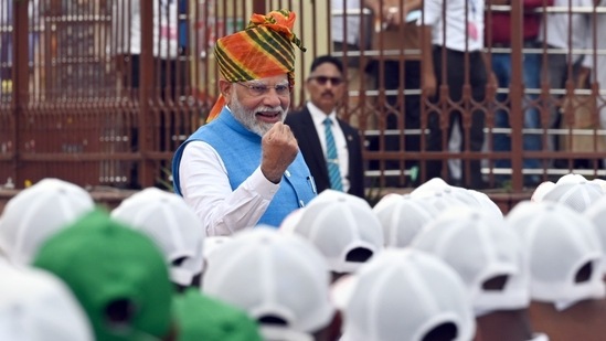 Prime Minister Narendra Modi greets children at the Red Fort on 78th Independence Day, in New Delhi, India, on Thursday, August 15, 2024.