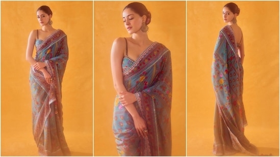 Ananya Panday attended the NMACC event in a green floral printed silk saree. She styled the drape with an embellished bralette-style blouse. Jhumkis, rings, minimal makeup, and a gajra-adorned bun glammed Ananya's ethnic look.&nbsp;(Instagram)