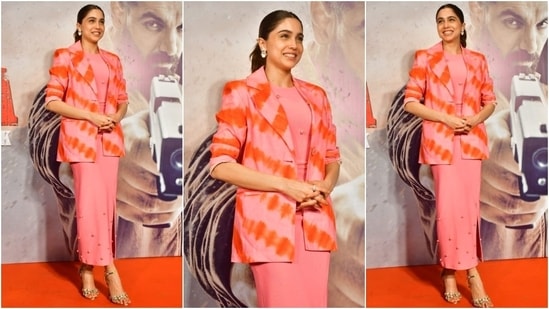Sharvari Wagh attended a promotion event for Vedaa in a blush pink ribbed dress embellished with pearl adornments. She styled the ensemble with a pink and orange printed blazer, embellished pumps, dainty earrings, a sleek ponytail, and minimal glam.&nbsp;(HT Photo/Varinder Chawla)