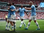 Erling Haaland celebrates a goal with his Manchester City teammates. Erling Haaland celebrates a goal with his Manchester City teammates.