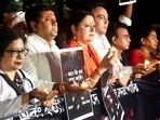Union Minister of State and BJP state President Sukanta Majumdar, party leader Agnimitra Paul and others during a candlelight march for the victim of the RG Kar Medical College and Hospital murder case (PTI Photo)