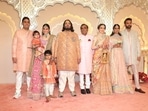 Mukesh Ambani, Akash Ambani, Shloka Ambani, Anand Piramal and Isha Ambani decked up in pastel outfits.