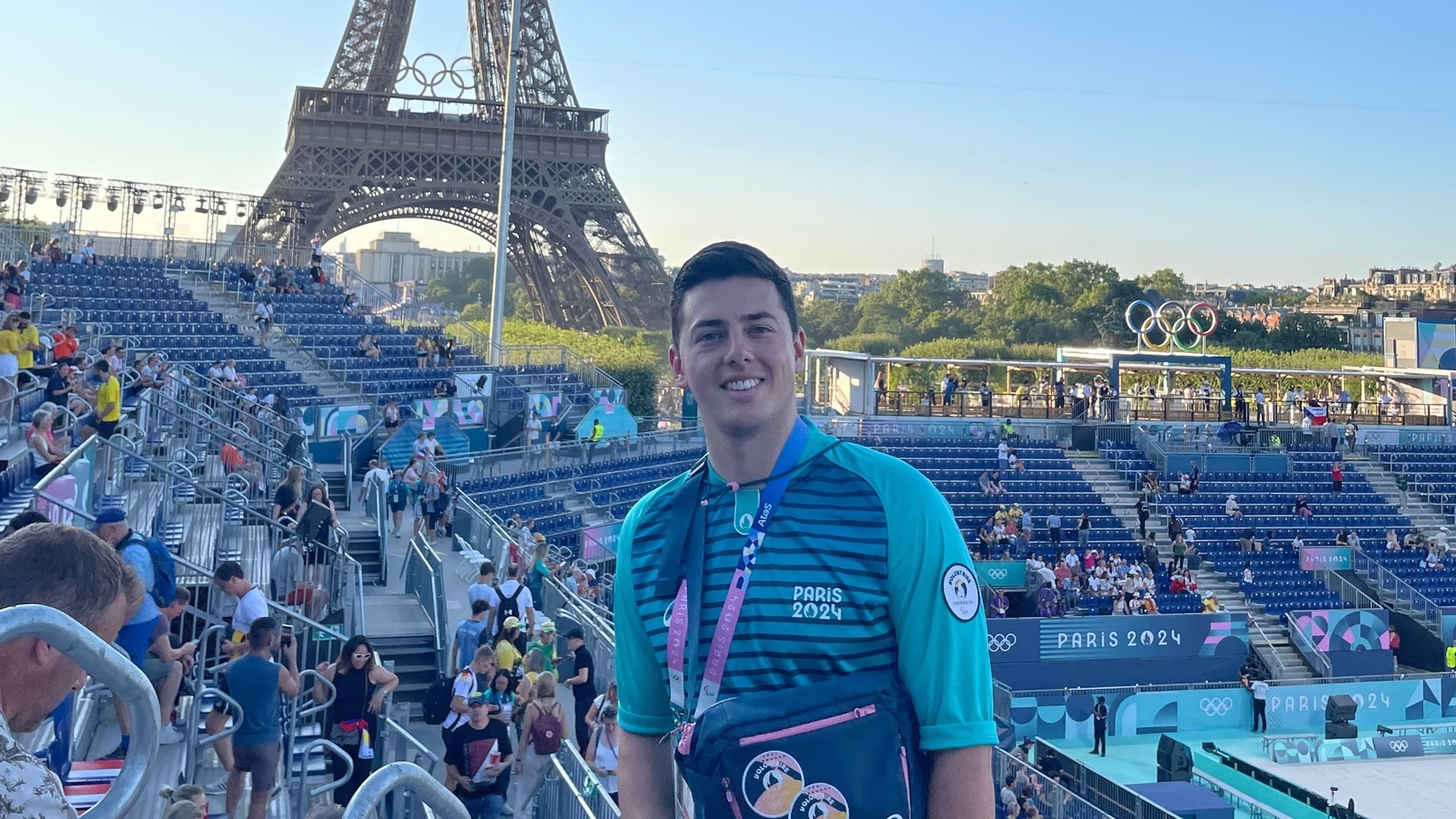 Parisian Volunteer Enchants Spectators at Eiffel Tower Olympic Venue