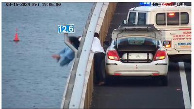 Swift rescue on MTHL as woman tries to drop images of gods in sea Swift rescue on MTHL as woman tries to drop images of gods in sea