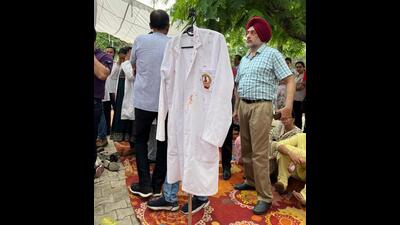 Doctors continuing with their indefinite protest in Patiala on Friday. Medical professionals at PGIMER, Chandigarh, also struck work demanding justice for the resident doctor who was raped and murdered at RG Kar Medical College in Kolkata on August 9. (HT Photo)