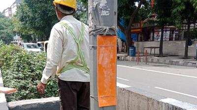 Over 25,000 junction boxes, located around 4-6ft high on streetlights, have been covered using PVC sheets in the past two weeks. (HT Photo) Over 25,000 junction boxes, located around 4-6ft high on streetlights, have been covered using PVC sheets in the past two weeks. (HT Photo)