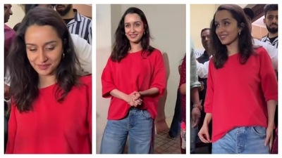 Shraddha Kapoor, the iconic relatable fashion icon, wore a casual, round-neck, oversized red top. She paired it with jeans, making the entire ensemble look breezy and relaxed. (Instagram/@varindertchawla)