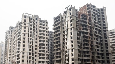 Almost 2000 under construction housing projects totalling over 5 lakh units across 44 cities have been stalled on account of financial mismanagement by real estate developers (Representational photo) (HT Archive) (Bloomberg file photo) Almost 2000 under construction housing projects totalling over 5 lakh units across 44 cities have been stalled on account of financial mismanagement by real estate developers (Representational photo) (HT Archive) (Bloomberg file photo)