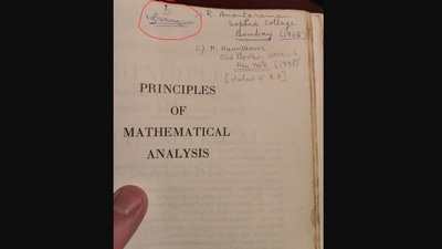 The image shows the maths book page with an inscription from an US man’s India professor. (X/@martinmrmar) The image shows the maths book page with an inscription from an US man’s India professor. (X/@martinmrmar)