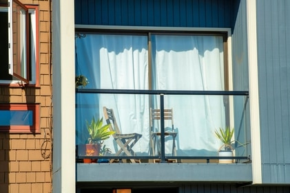 Add waterproof curtains to your balcony; a budget-friendly option. (Shutterstock) Add waterproof curtains to your balcony; a budget-friendly option. (Shutterstock)