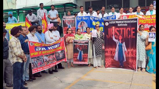 Doctors and other health workers during a protest in the civil hospital, Bathinda, on Friday. (Sanjeev Kumar/HT)