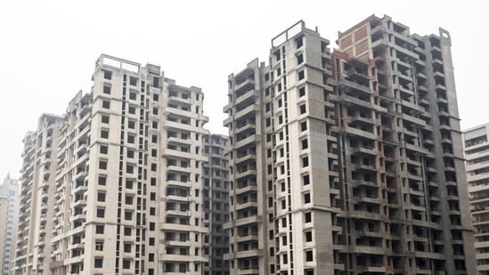 Almost 2000 under construction housing projects totalling over 5 lakh units across 44 cities have been stalled on account of financial mismanagement by real estate developers (Representational photo) (HT Archive)(Bloomberg file photo)