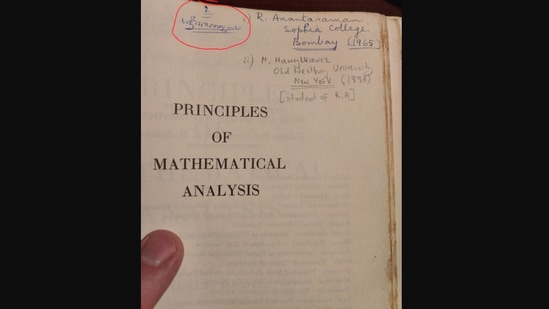 The image shows the maths book page with an inscription from an US man’s India professor. (X/@martinmrmar) The image shows the maths book page with an inscription from an US man’s India professor. (X/@martinmrmar)
