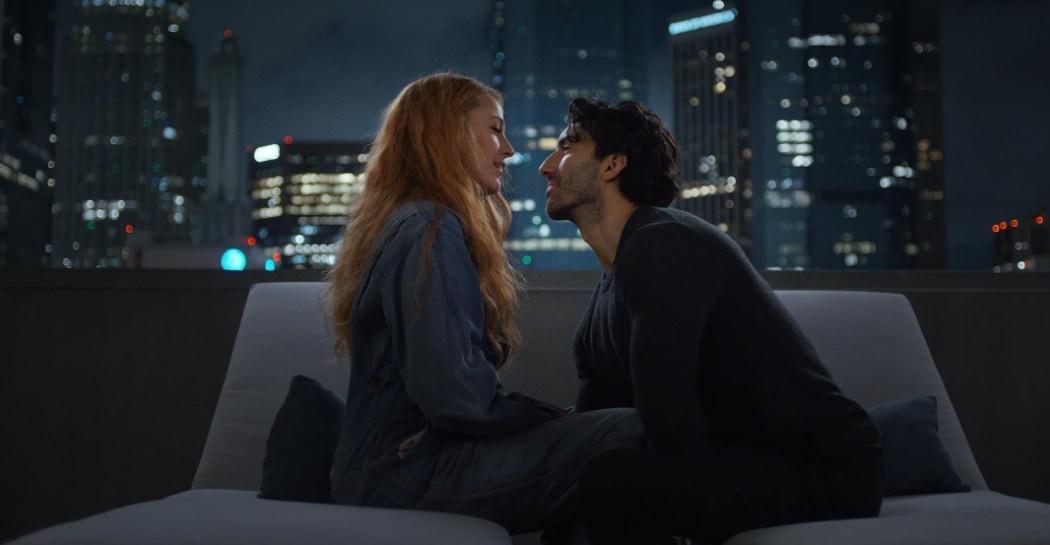 A still from the rooftop scene featuring Blake Lively and Justin Baldoni in It Ends With Us.