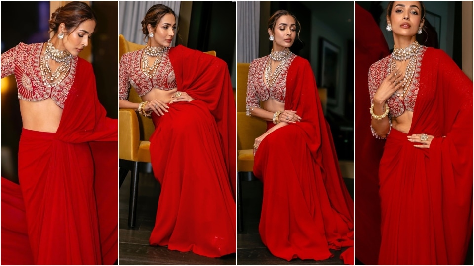 Malaika Arora wears a red saree for the 15th Indian Film Festival of Melbourne opening night. 