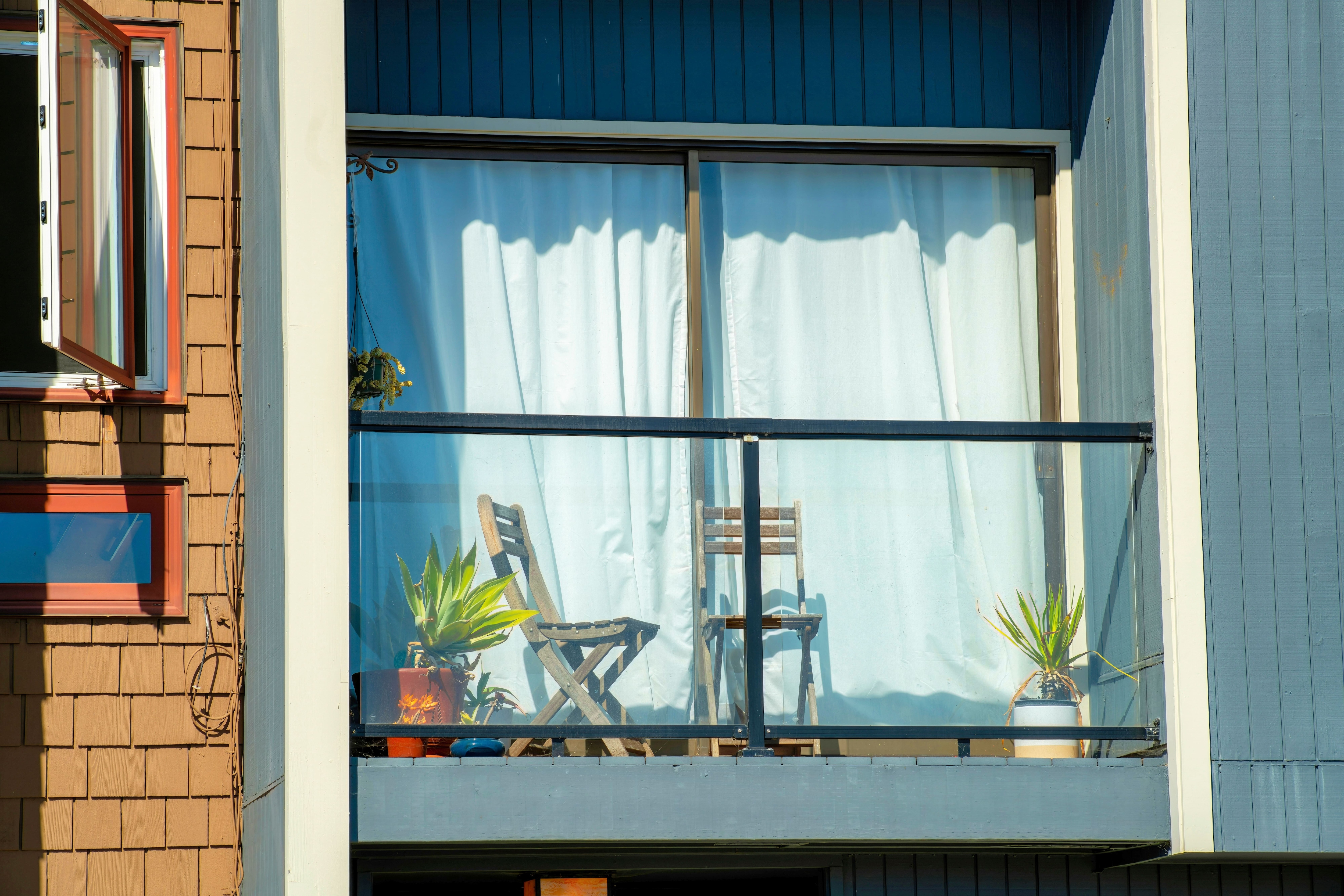 Add waterproof curtains to your balcony; a budget-friendly option.(Shutterstock) Add waterproof curtains to your balcony; a budget-friendly option.(Shutterstock)
