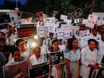Doctors hold posters and shout slogans during a protest march demanding justice following the rape and murder of a trainee medic at a hospital in Kolkata, in Ahmedabad, India, August 17, 2024. REUTERS/Amit Dave